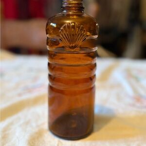 Vintage Amber Glass Bottle with Shell Design